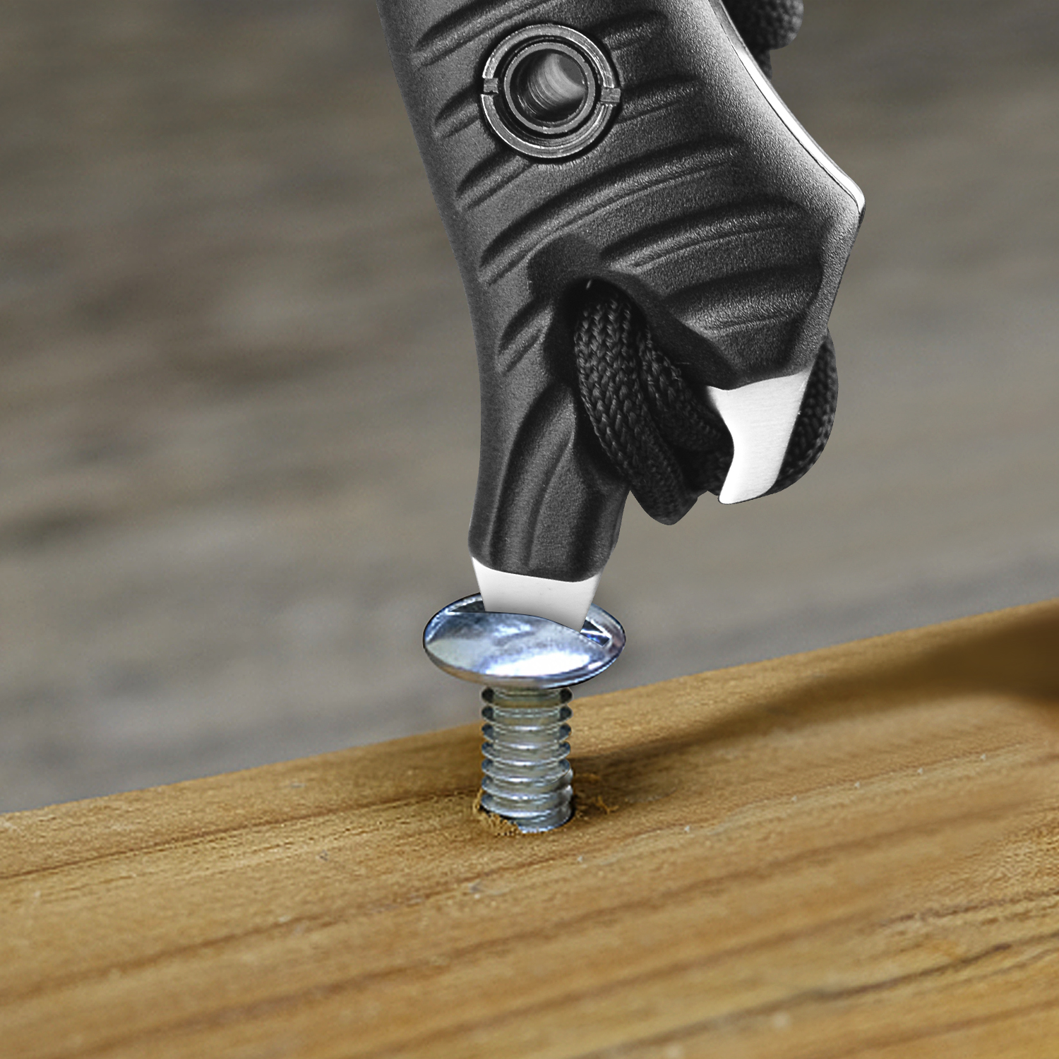 Close-up of a joiner hand with a wrench screwing nut a furniture screw into a wooden plank, The effort  wrong of tools as a fail concept